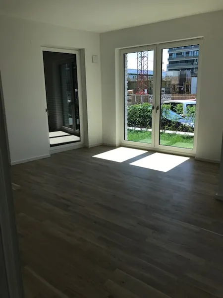 Helle 2-Zimmer-Wohnung mit Terrasse & Mietergarten — photo 1